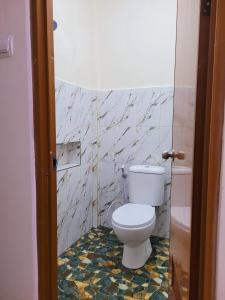 Koupelna v ubytování Wahyu Putri House Yogyakarta