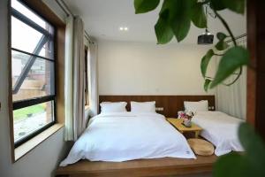 Fotografie z fotogalerie ubytování 井邻栗林花园民宿 v destinaci Chuaj-žou