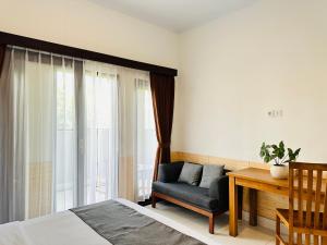 Posezení v ubytování Gangga Guest House