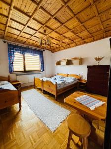 A bed or beds in a room at Privát Gallik