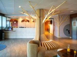 Area soggiorno di ibis Styles Guéret