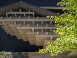a stack of bleachers on the side of a building at Banyan Tree Higashiyama Kyoto in Kyoto