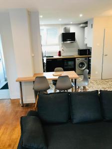 Una cocina o cocineta en Le fontaine écu