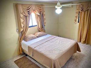 Ένα ή περισσότερα κρεβάτια σε δωμάτιο στο Home