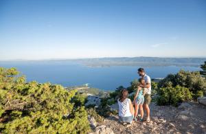 a group of people standing on top of a mountain at Bluesun Hotel Borak in Bol