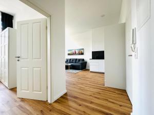 TV a/nebo společenská místnost v ubytování Moderne Ferienwohnung inmitten der Altstadt