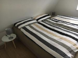 Postel nebo postele na pokoji v ubytování Ferienhaus Tim Paul