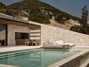 Piscina di Esthesis Beachfront Villas, with Heated Pool, By ThinkVilla o nelle vicinanze