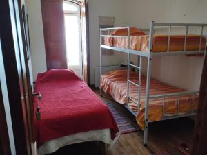Postel nebo postele na pokoji v ubytování Dom Camilo Alojamento local