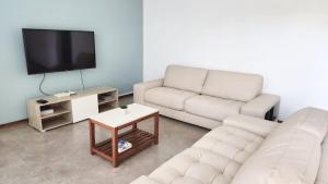 TV a/nebo společenská místnost v ubytování La Maison d'Isa