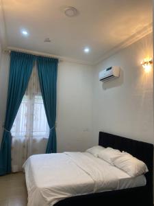 Giường trong phòng chung tại Preshome