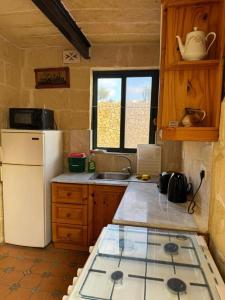 Kuchyň nebo kuchyňský kout v ubytování Ta Speranza Farmhouse B&B