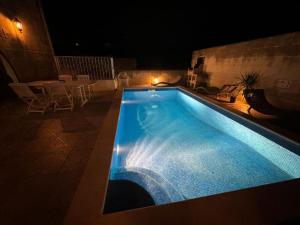 Bazén v ubytování Ta Speranza Farmhouse B&B nebo v jeho okolí