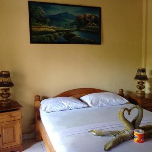 Postel nebo postele na pokoji v ubytování Hotel Dupa