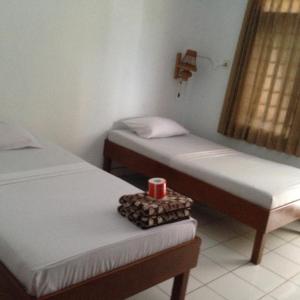 Postel nebo postele na pokoji v ubytování Hotel Dupa