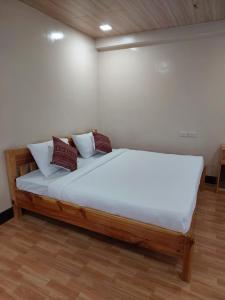 Postel nebo postele na pokoji v ubytování Quarry Bay Hometel Sagada