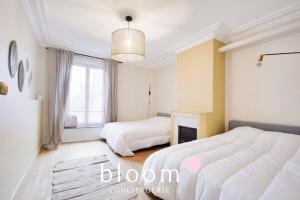 Posteľ alebo postele v izbe v ubytovaní L’Éclat de Stanislas 90m2 6p