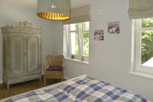 Ένα ή περισσότερα κρεβάτια σε δωμάτιο στο Villa De Meere Whg 8