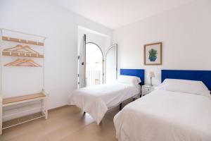 Postel nebo postele na pokoji v ubytování OleHousing-San Lorenzo