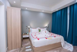 Vibes Hotel and Spa客房内的一张或多张床位