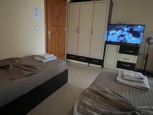 Postel nebo postele na pokoji v ubytování Hotel Iseberi