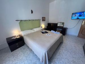 TV a/nebo společenská místnost v ubytování La Baia Di Tindari by Holiday World