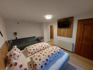 Postel nebo postele na pokoji v ubytování Hotel & Alpengasthof Pinzgerhof