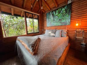 Postel nebo postele na pokoji v ubytování Skyline Ecoliving Santa Elena