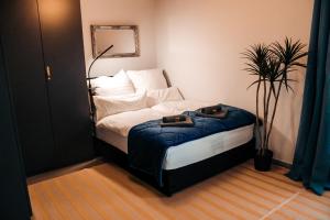 Postel nebo postele na pokoji v ubytování Sunnybelle Appartements Medingen