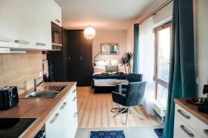 Kuchyň nebo kuchyňský kout v ubytování Sunnybelle Appartements Medingen