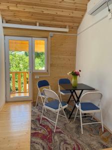 Фотография из галереи Marisi Cottage - კოტეჯი მარისი в Амбролаури