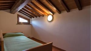 Postel nebo postele na pokoji v ubytování Agriturismo Casale trieste