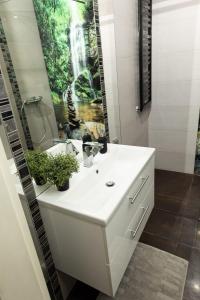 Bilik mandi di Apartament Symfonia +5 gambar
