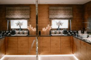 A kitchen or kitchenette at Hotel Sonnegg