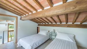 Ένα ή περισσότερα κρεβάτια σε δωμάτιο στο Villa Vinsantaia