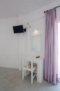 TV a/nebo společenská místnost v ubytování Sunrise Hotel