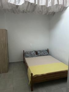 Postel nebo postele na pokoji v ubytování Lemonia