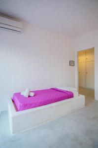 Postel nebo postele na pokoji v ubytování Sunrise Hotel