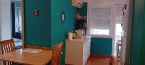 Kuchyň nebo kuchyňský kout v ubytování Apartman TIN