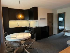 Η κουζίνα ή μικρή κουζίνα στο Flott Leilighet i stølen oppdal for 6 personer, ski in, ski out