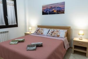 Postel nebo postele na pokoji v ubytování Casa Vacanze Ines