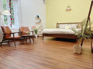 Ein Bett oder Betten in einem Zimmer der Unterkunft Mô Tê Homestay 2 gần Chợ Đông Ba, Cung Đình Hoàng Thành Huế