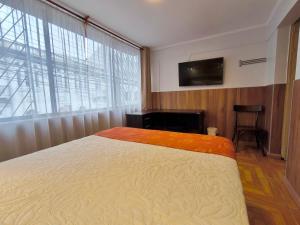 Postel nebo postele na pokoji v ubytování Hotel Intillanka