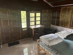 Ein Bett oder Betten in einem Zimmer der Unterkunft Treehouse at Kamp
