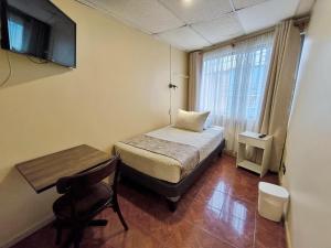 Postel nebo postele na pokoji v ubytování Hotel Intillanka