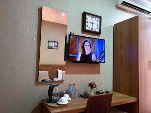 TV a/nebo společenská místnost v ubytování Family Hotel - Free Massage