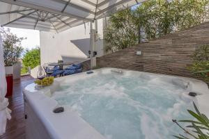 Bazén v ubytovaní PANORAMICA - Apartman alebo v jeho blízkosti