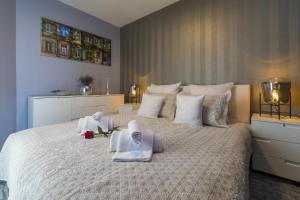 Posteľ alebo postele v izbe v ubytovaní PANORAMICA - Apartman + 22 fotografií