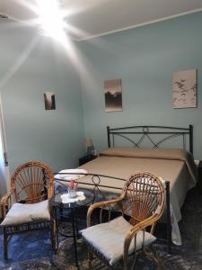 Postel nebo postele na pokoji v ubytování B&B Zì Camillo