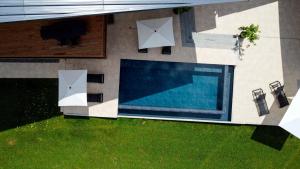 an overhead view of a swimming pool in a yard at Schwarzwald Chalet Auwald in Freiamt